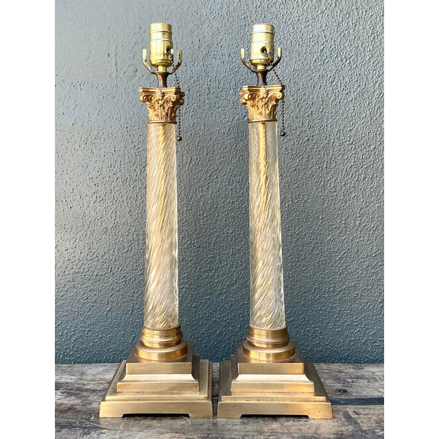 Capture the refined grandeur of the mid-20th century with this exquisite pair of Neoclassical column table lamps. These...