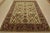 A traditional Agra rug is hand-knotted with an all-wool pile on a cotton foundation. This finely woven oriental rug...