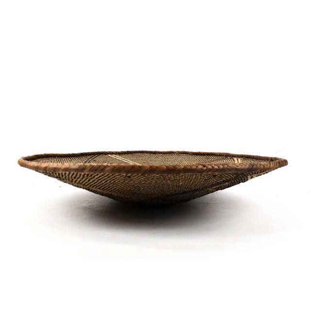 Tonga Binga baskets are traditional handcrafted baskets made by the Tonga women of Binga district in Zimbabwe. Crafted...