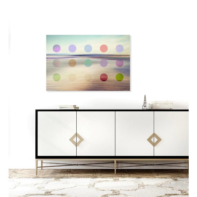 Cameron's unique seascape fine art is more modern with colourful dots added with symmetry. The vintage hues add a warth...