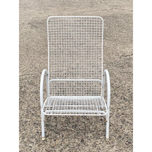 Vintage Mid Century Modern Reclining Wrought Iron Sculptural Patio Lounge Chair. Item features steel and iron reclining...
