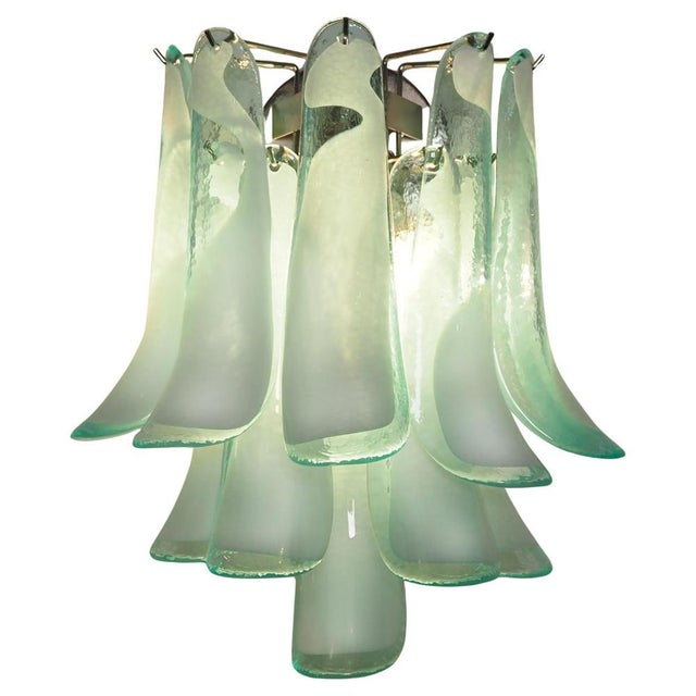 Pair of Vintage Italian Murano appliques in the manner of Mazzega. Wall lights have 10 turquoise and white “lattimo”...