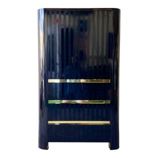 Postmodern Black Gloss and Matte Striped Laminate Armoire With Gold Paneling For Sale