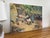 Possibly acrylic. Painting on Canvas, nailed to the frame as shown. Peaceful city scene. Vintage Condition Consistent with...