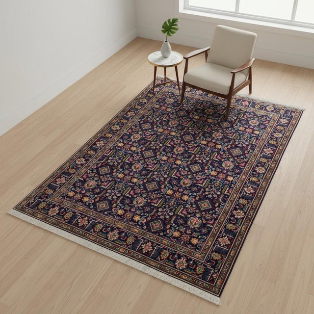 This vintage Afghan rug features a beautifully hand-knotted construction, with vibrant geometric and floral motifs....