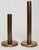 Elegant pair of patinated brass candlesticks - one tall, one short (ca. 1970s, USA). Composed of elongated tapers...