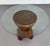 1970s dining table in woven rattan with a round beveled glass top