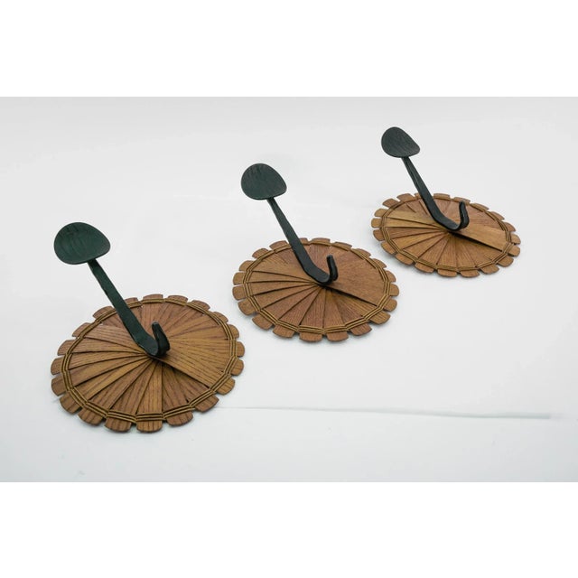 Stunning coat hooks for individual attachment to the wall. Extremely rare and very decorative.