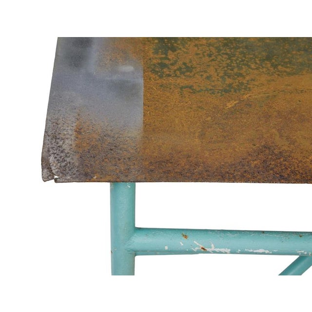 Large 1920’s painted industrial steel table here we present a unique table that was found local to us. Extensive original...