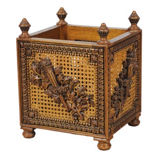 Antique French Carved Walnut and Cane Jardinière With Torch and Floral Motifs For Sale