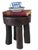 Expertly carved from a single piece of wood, this vintage African Old Carved Wood Milk Stool showcases four sturdy legs...