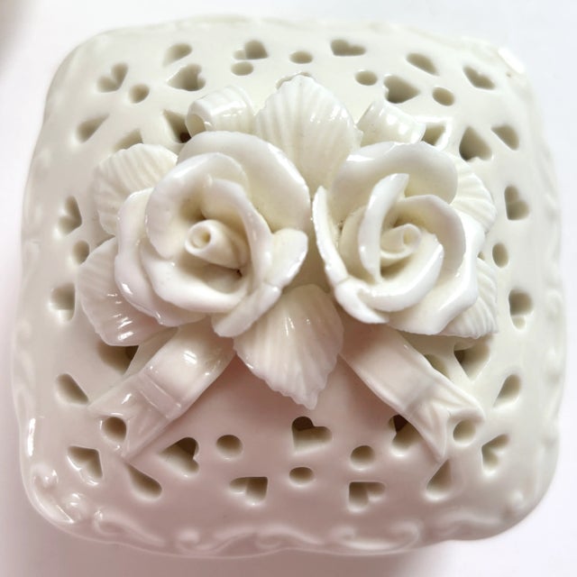 Stash your treasures, sweets, keys...anything in this charming pair of vintage porcelain boxes. Or wrap a special gift...