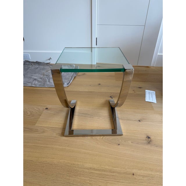 Modern side table featuring a chrome z base. Great condition. 16”W x 16”D x 19”H 18.75” clearance base 1.5”W