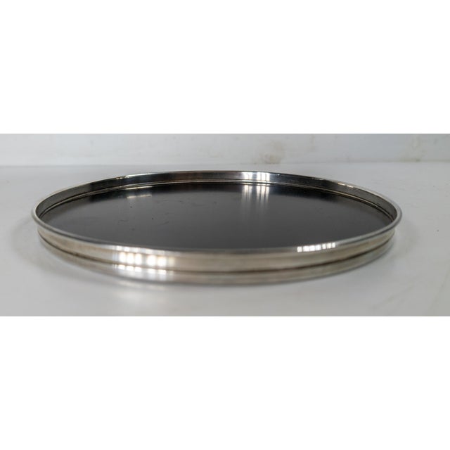 We are selling this decorative Mid-Century Sterling silver and black lacquer tray by Gorham. This tray has simple elegant...