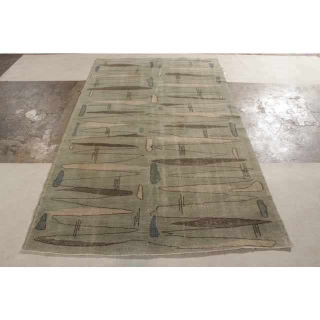 Hand knotted in wool from Turkey circa 1960-1970, a 5x8 rug joining Rug & Kilim’s Mid-Century Pasha Collection celebrating...