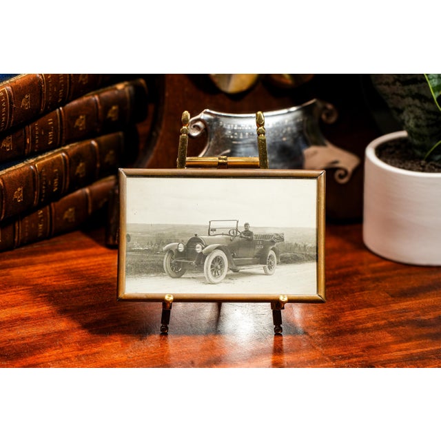 This captivating black and white photograph, dating to circa 1918, offers a poignant glimpse into the life of a US soldier...