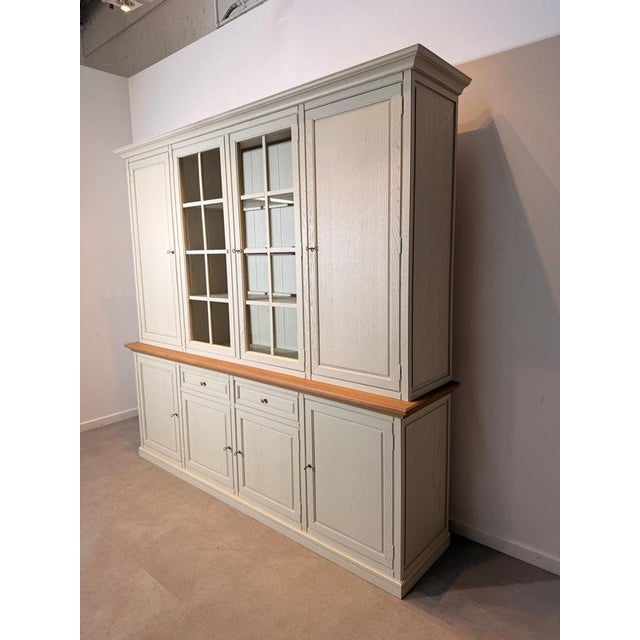Impressive large-scale rural oak display cabinet, combining generous storage with a timeless country-style design....