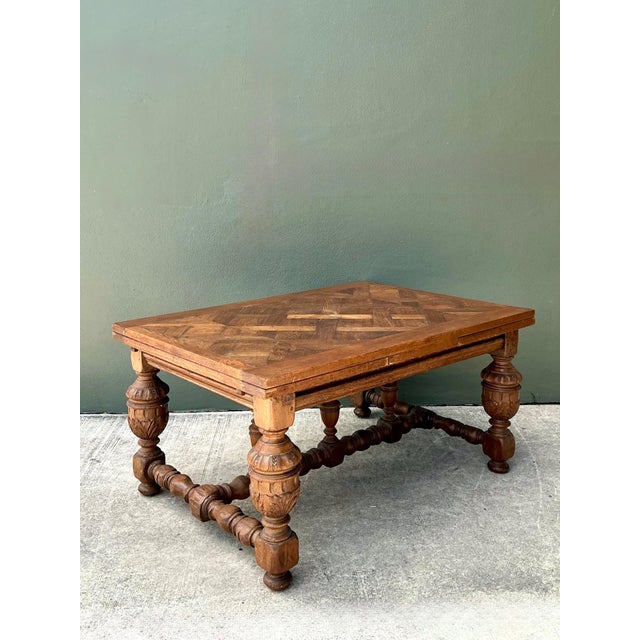 Showcasing the enduring elegance of traditional Spanish craftsmanship, this vintage extendable dining table is expertly...