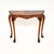 A lovely antique console side table in the Queen Anne style. This was made in England, it dates from around the 1930’s. It...