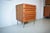 This is a vintage chest of drawers from the Danish manufacturer Kollund Möbler. The chest features a cubic design with a...
