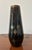 Black blown glass vase with dark amethyst highlights, decorated with gold-colored Jugendstil geometric motifs. Early 20th...