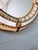 Large Hollywood Regency style mirror, produced in Spain in the 1970s-80s. Beautiful glass mosaic and brass garland. Very...