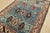 An authentic vintage tribal Heriz rug hand-knotted with fine wool on a cotton foundation. This rug features geometric...
