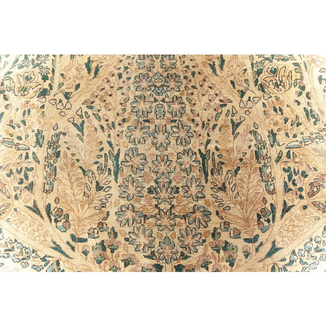 Praised for their beautiful designs, Kirman rugs are considered to be one of the most sought-after types of antique...
