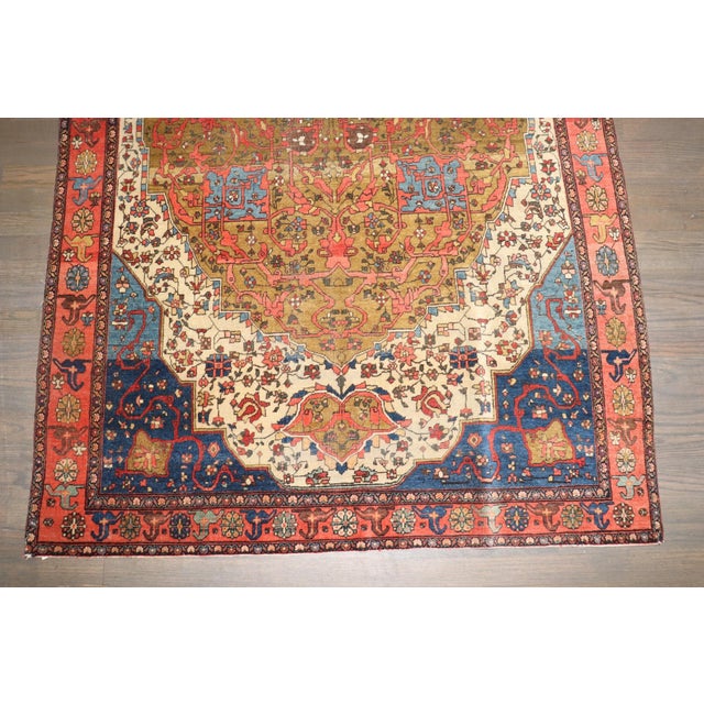 a late 19th Century Ivory Field Persian Sarouk Fereghan Rug