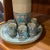 Fantastic Mexican stoneware tequila set, consisting of a bottle, indistinctly signed, 10.75" tall, six shot glasses 2.25"...