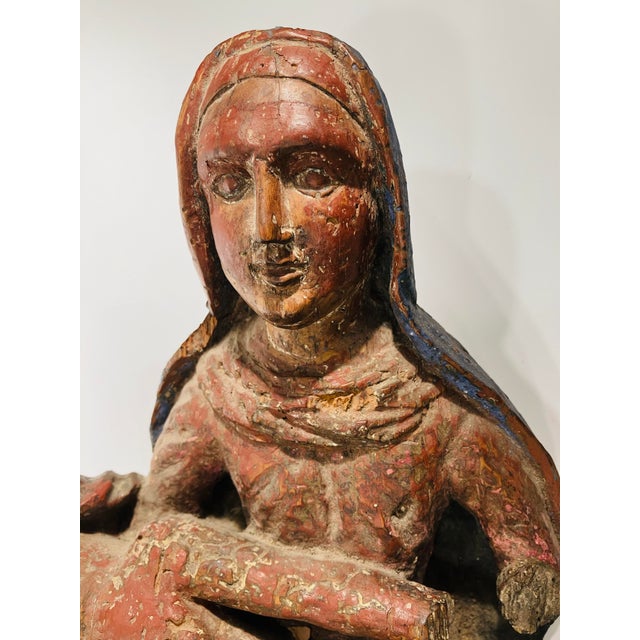 This sculpture of the Pieta retains the original paint in some areas There are losses expected for a sculpture of this...