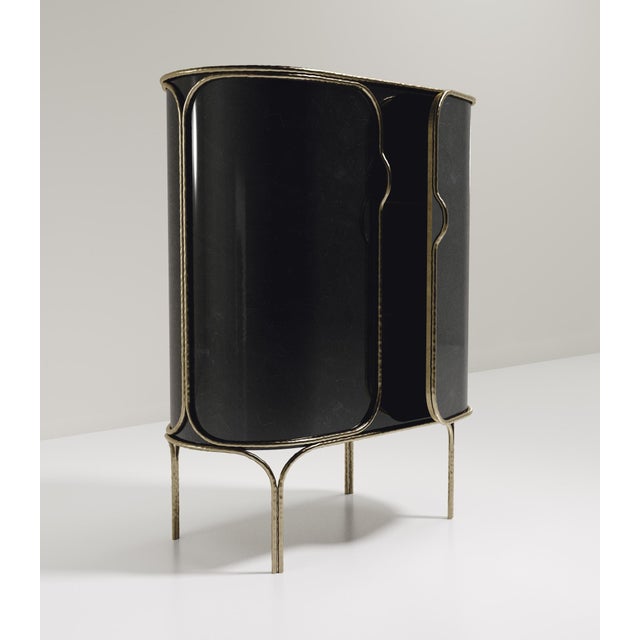 The Arianne Bar Cabinet by R&amp;Y Augousti is a masterclass in form and finish, pictured here in captivating black pen...