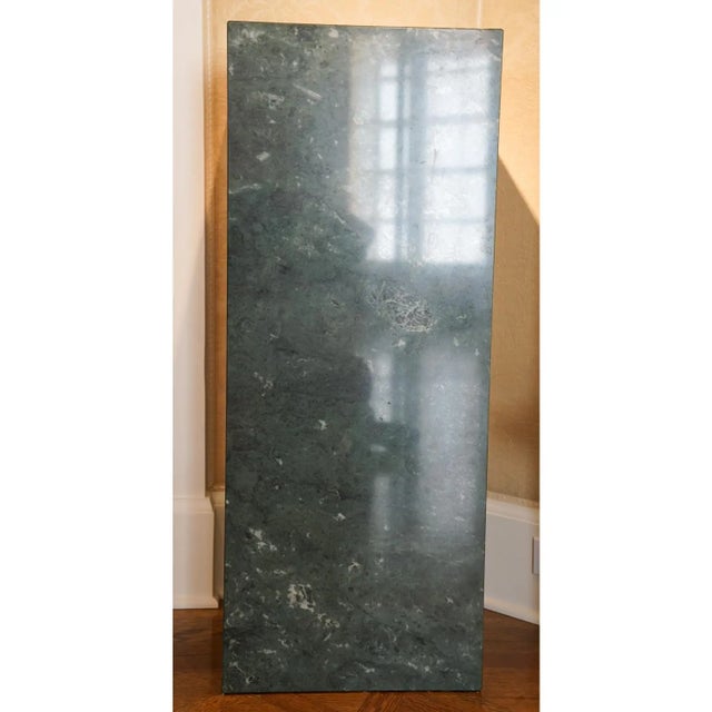 Lovely pedestal for your favorite sculpture or vase. Green marble with lighter green, black and white veining. Veining is...
