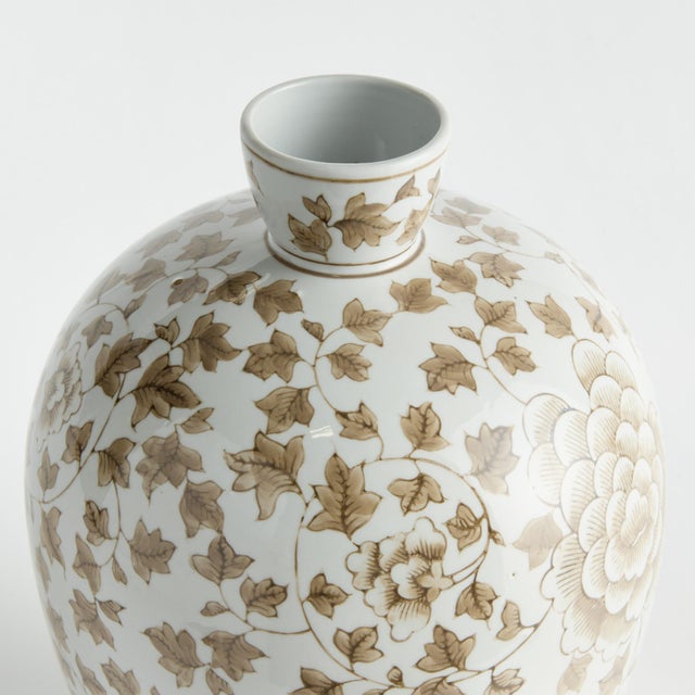 A classic chinoiserie pattern in taupe andWhite. In design, taupe is often associated with muted, sophisticated qualities....