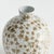 A classic chinoiserie pattern in taupe andWhite. In design, taupe is often associated with muted, sophisticated qualities....