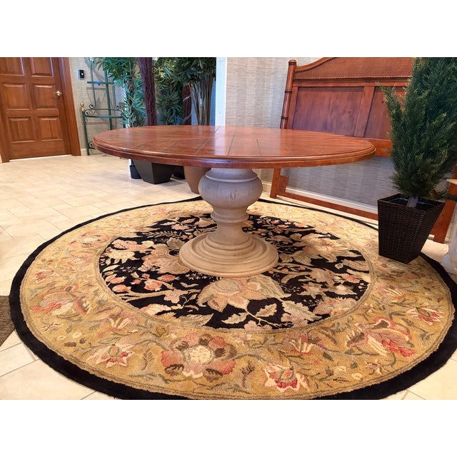 This Town and Country Centre Table has a top design that combines planked boards in a reverse diamond pattern. An...