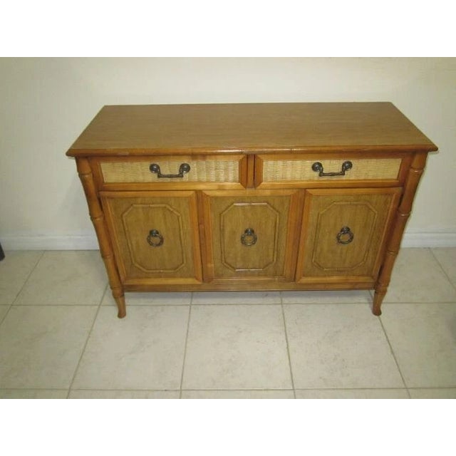 This beautiful buffet side board server is a true gem for any antique lover out there. It features a Hollywood Regency...