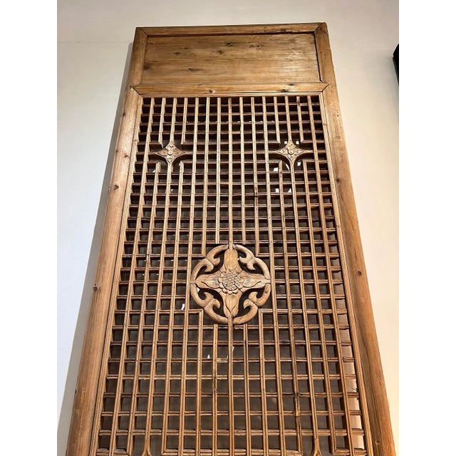 Vintage carved lattice work wood screen door / panel. Wonderful piece with characteristic signs of age and use.