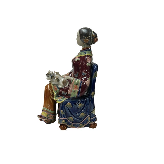 This porcelain lady figure is an exquisite testament to classical artistry, capturing the elegance of traditional Chinese...