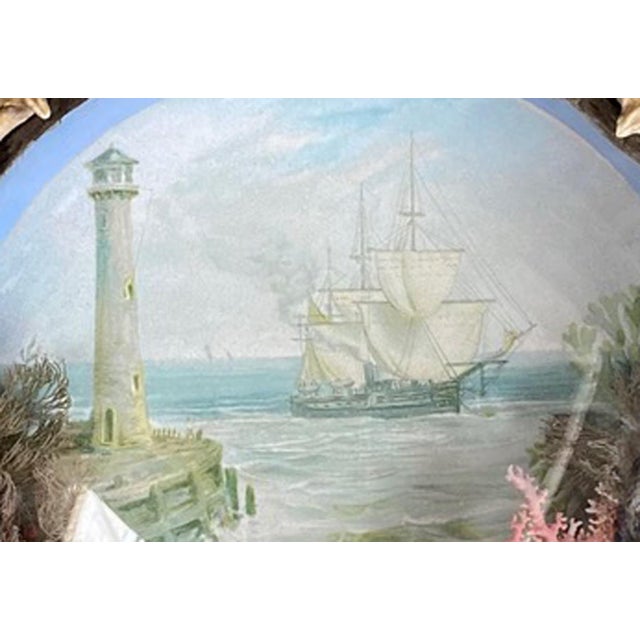Edwardian Shellwork Valentine Diorama of a Lighthouse with Ship Date: Circa 1900 Origin: England Materials: Shells, coral,...