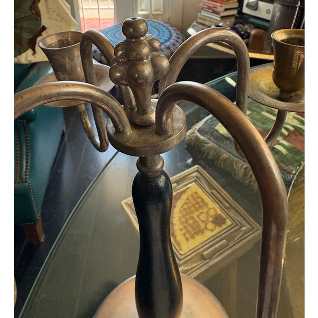 Beautiful centerpiece or functional art, take this art deco candelabra home as an element of history and design. About 100...