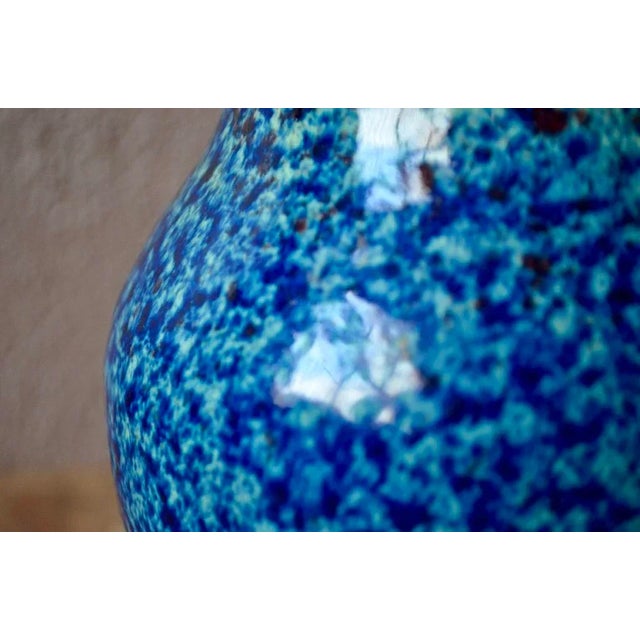 This Grand Vase Pansu is a production of the potters of Accolay. Its special speckled enamel is typical of Accolay...