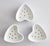 A charming set of three vintage french ironstone heart-shaped cheese mold dishes. They were traditionally used in France...