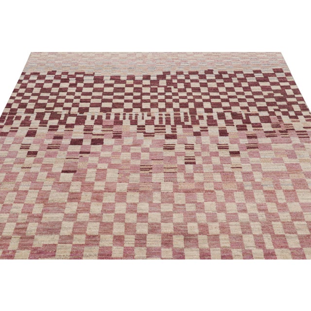 Hand-knotted in wool and silk, this 6x10 contemporary rug from Rug & Kilim features geometric patterns with a modern...