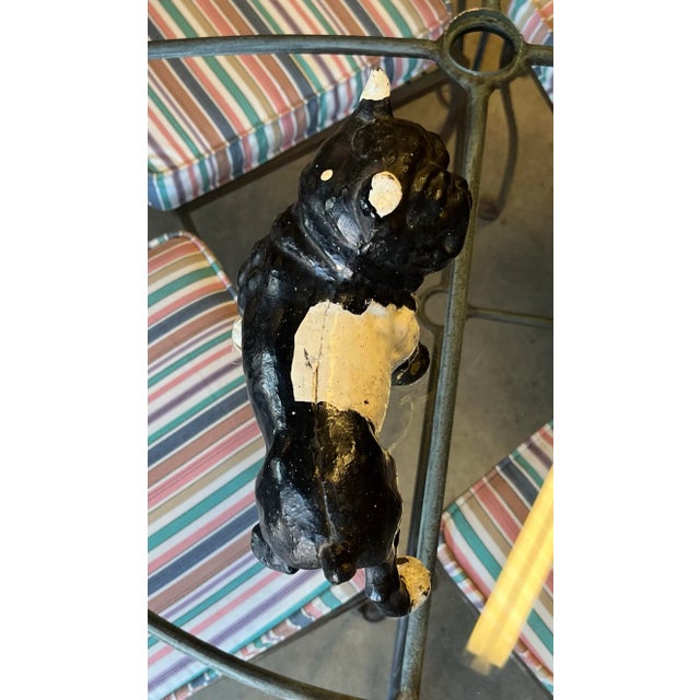 Cast iron doorstop of a bulldog, possibly by Hubley. Two piece construction, but it appears to have been welded...