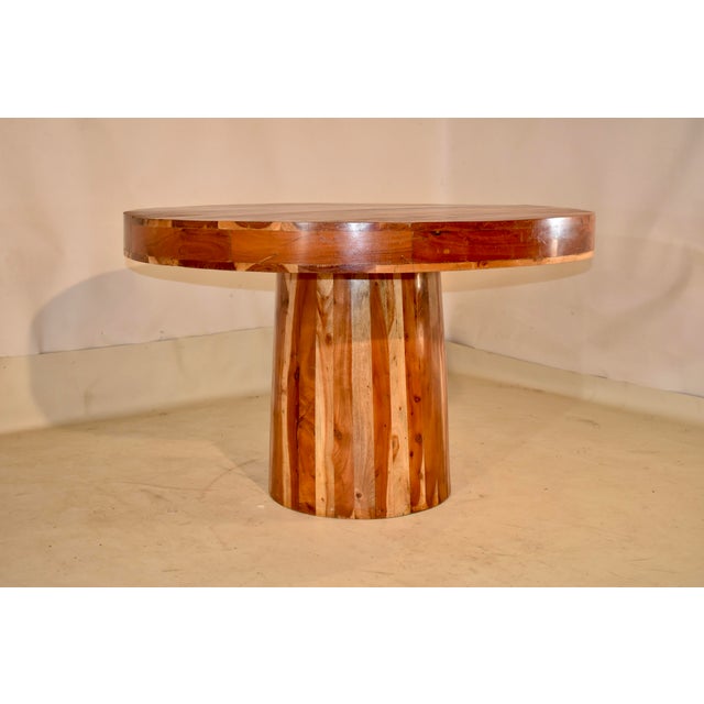 Natural Redwood Round Pedestal Dining Table, Circa 1970's An exceptional organic modern natural solid redwood round...
