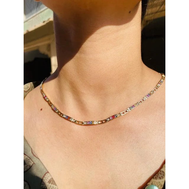 This is part of Chairish’s Fine Jewelry assortment. Multi Sapphire Necklace in 18K Gold studded with square cut sapphire...