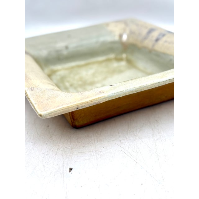 Large, deep ceramic dish by Pierre Culot, signed with his stamp. This piece has an attribution mark, I am sure that it is...