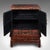This is an antique campaign cabinet on stand. An Oriental, lacquered canvas over pine Chinoiserie cupboard, dating to the...