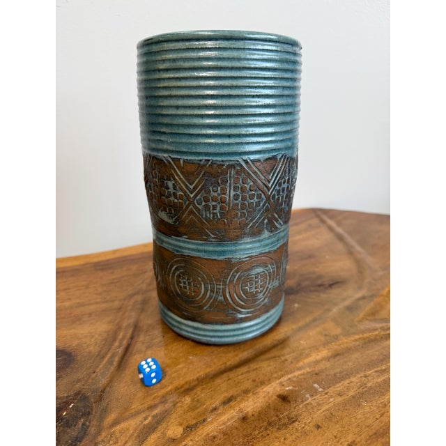 Vintage mid century large pottery vase in the style of Bitossi. Handmade pottery with a blue and brown glaze with...